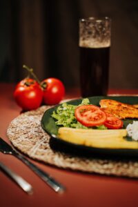 dark beer with vegetable plate